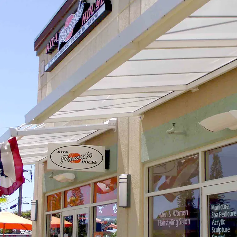 LiteBrow™ Suspended Canopy System over Shopping Center Entryway