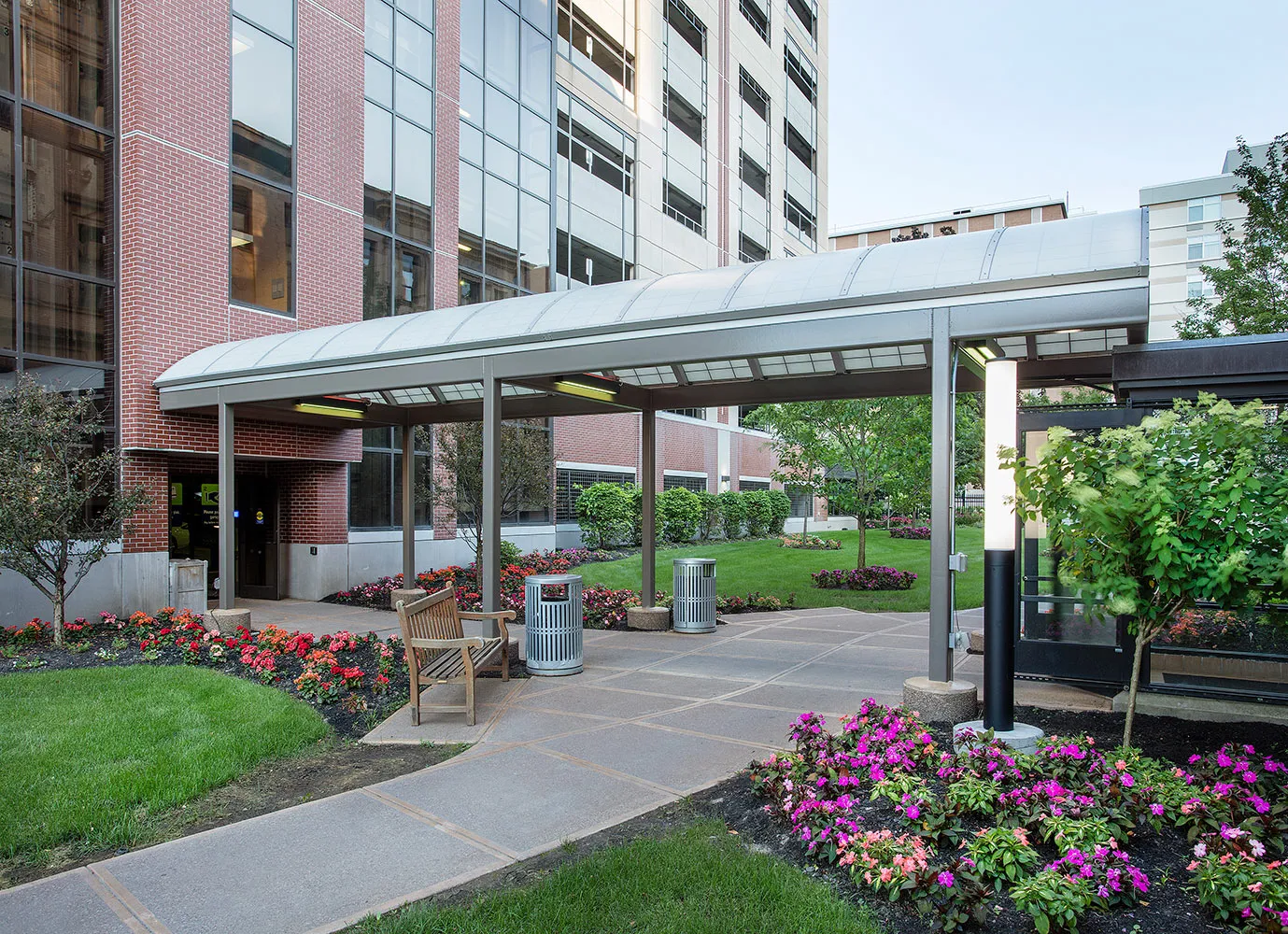 Liteway™ FRP curved canopy system over walkway between two hospital buildings