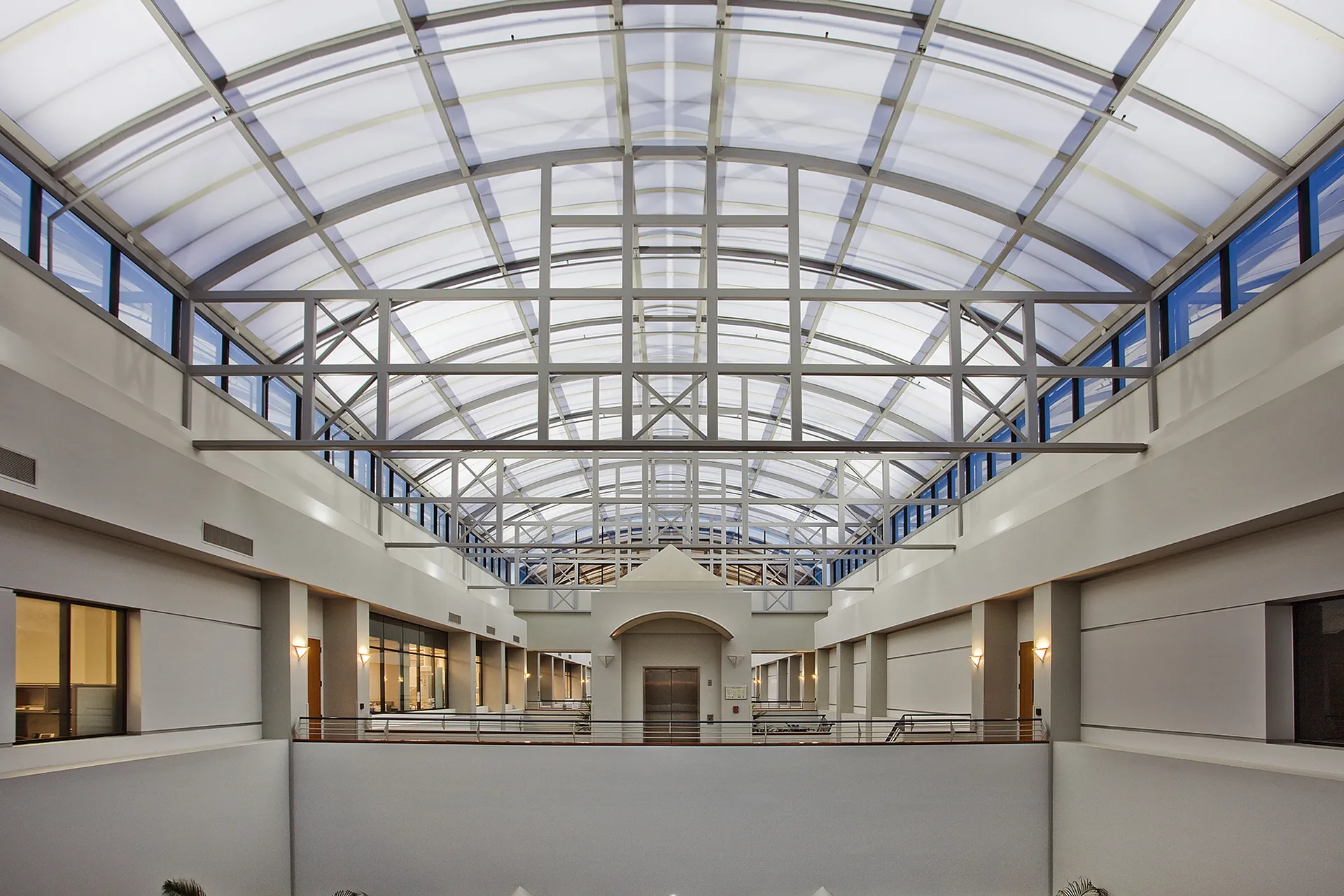 QuadSpan™ Polycarbonate Skylight - custom curved design in office space