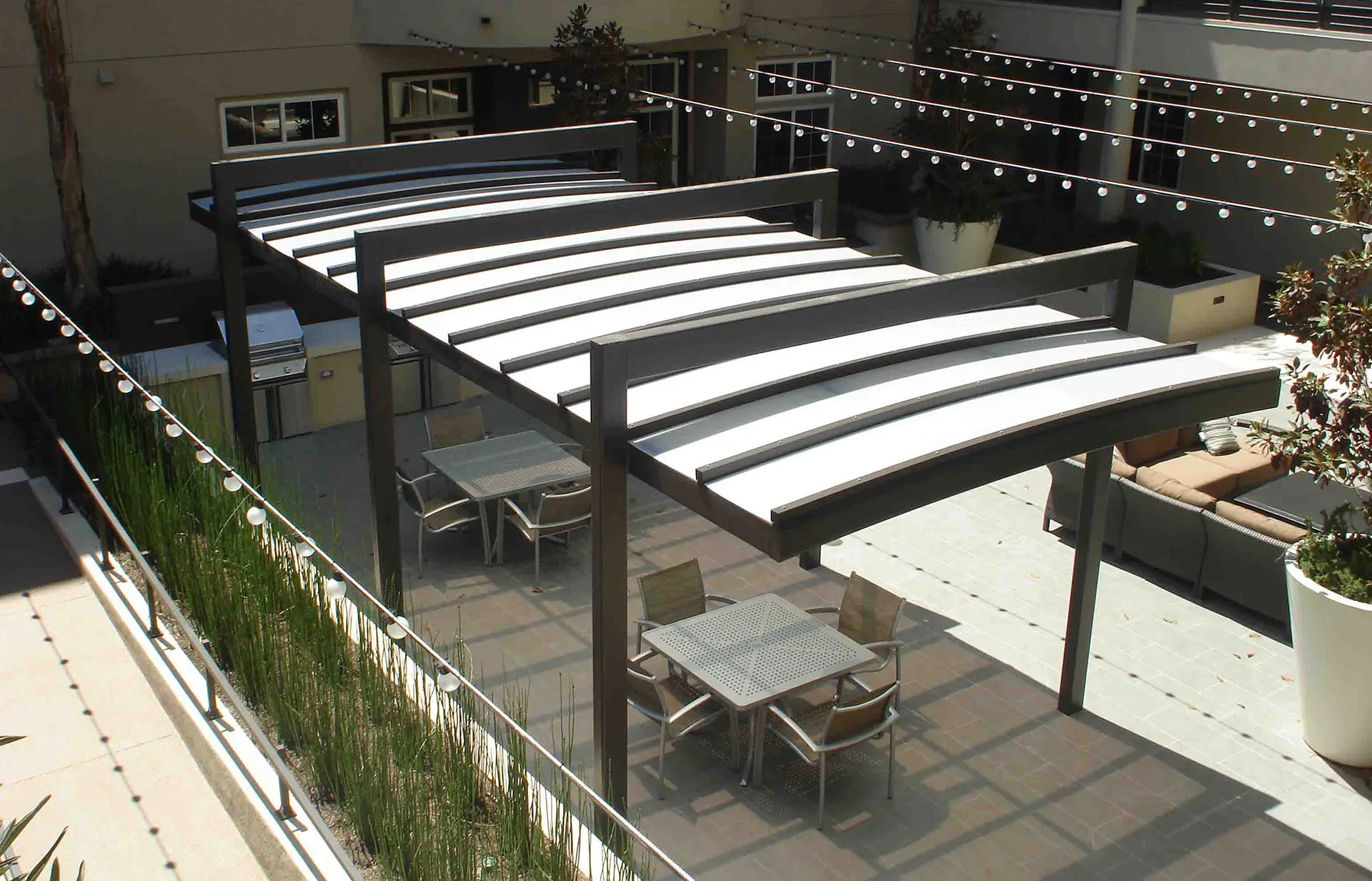 U-Lite™ Polycarbonate Canopy over patio seating area