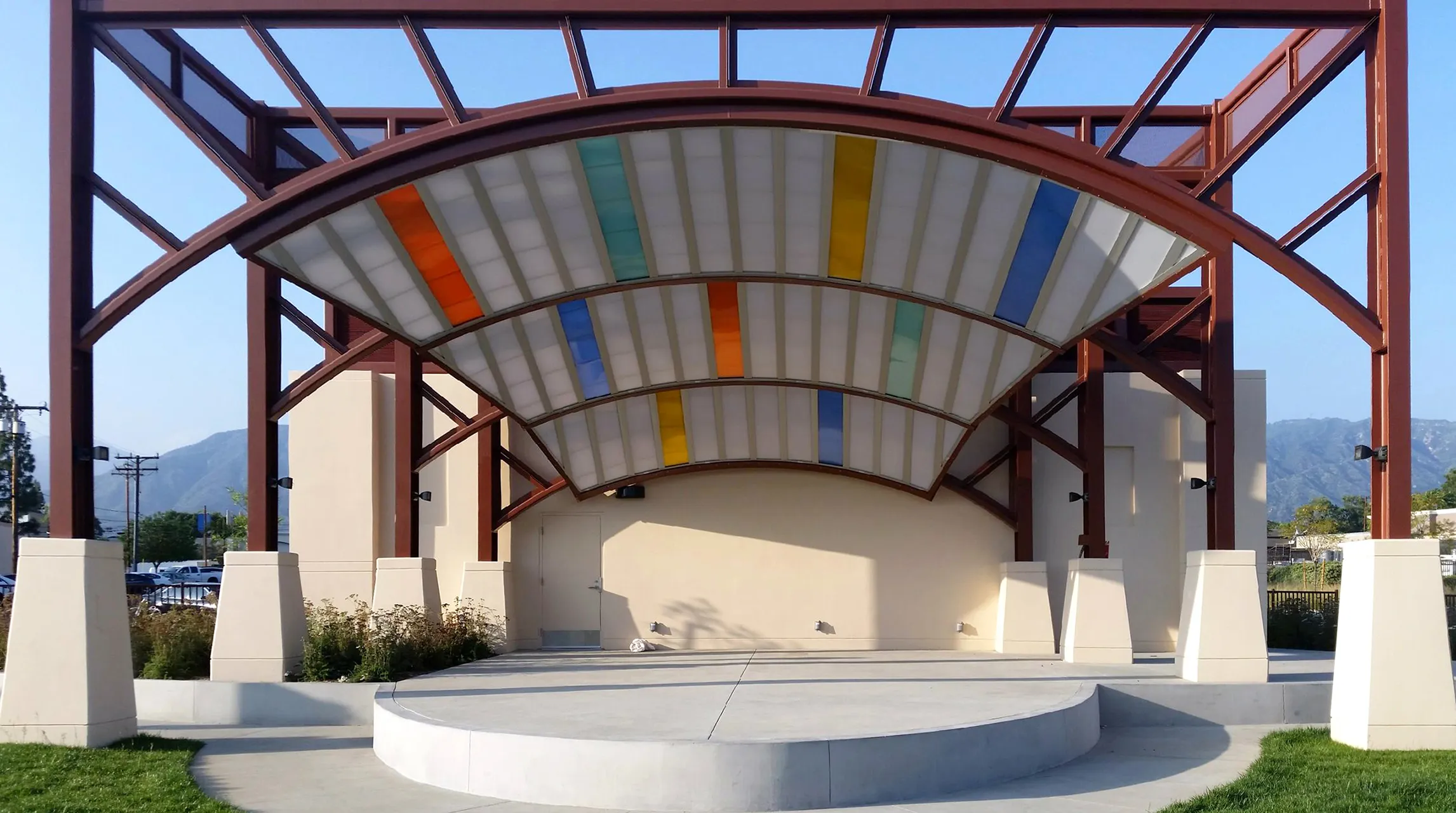 Briteway® polycarbonate canopy with multiple glazing colors over outdoor space