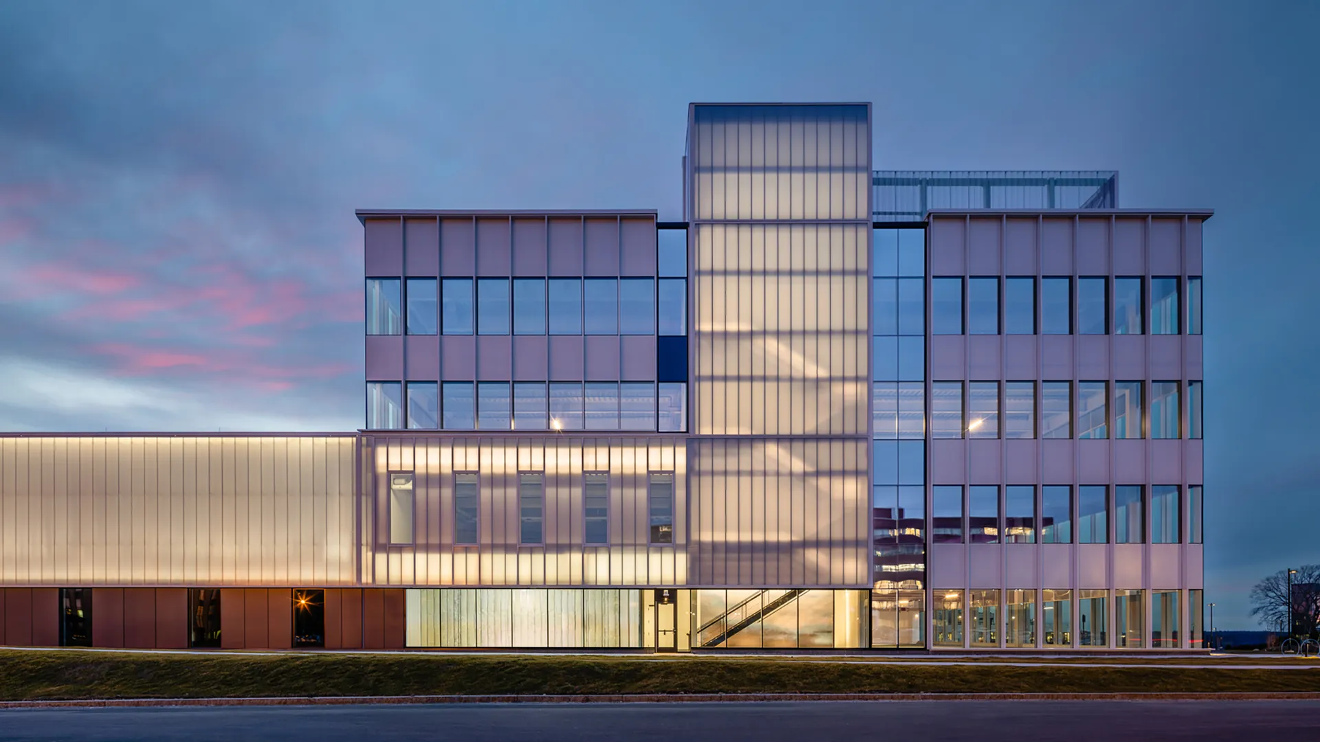 UniQuad polycarbonate wall system - backlit during evening hours