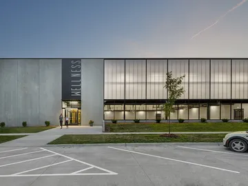 UniQuad wall system in athletic and wellness center - backlit exterior