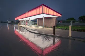 PentaClad™ polycarbonate cladding system in bright colors to match a sports team and highlight a pick-up area for transportation