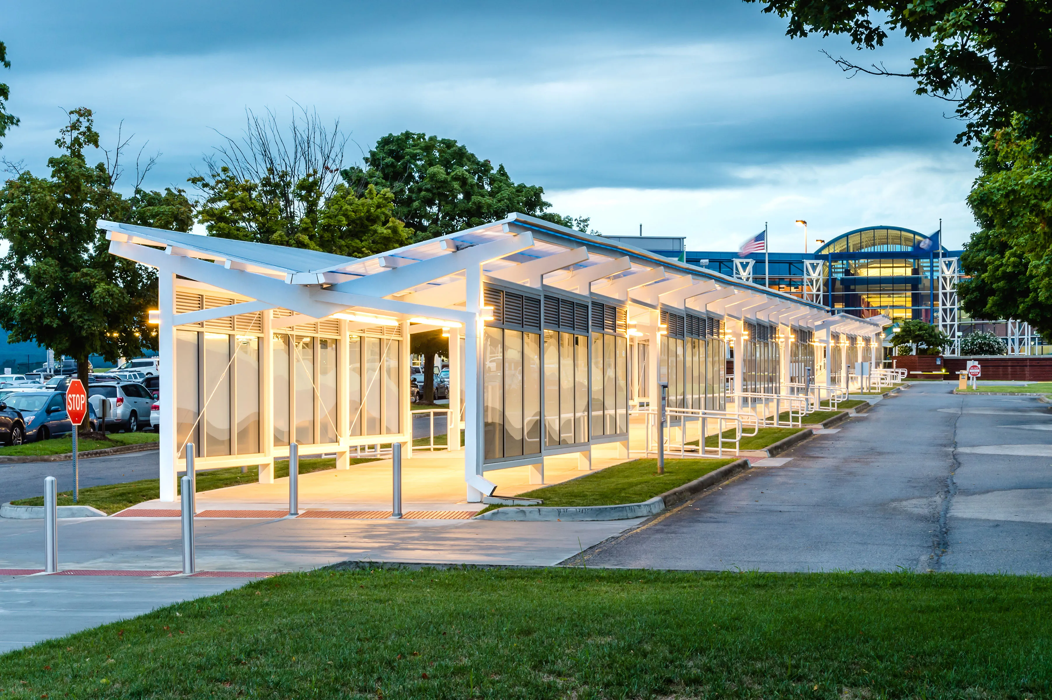 Briteway® polycarbonate canopy over airport parking area walkway