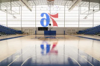 UniQuad polycarbonate wall system in basketball court area