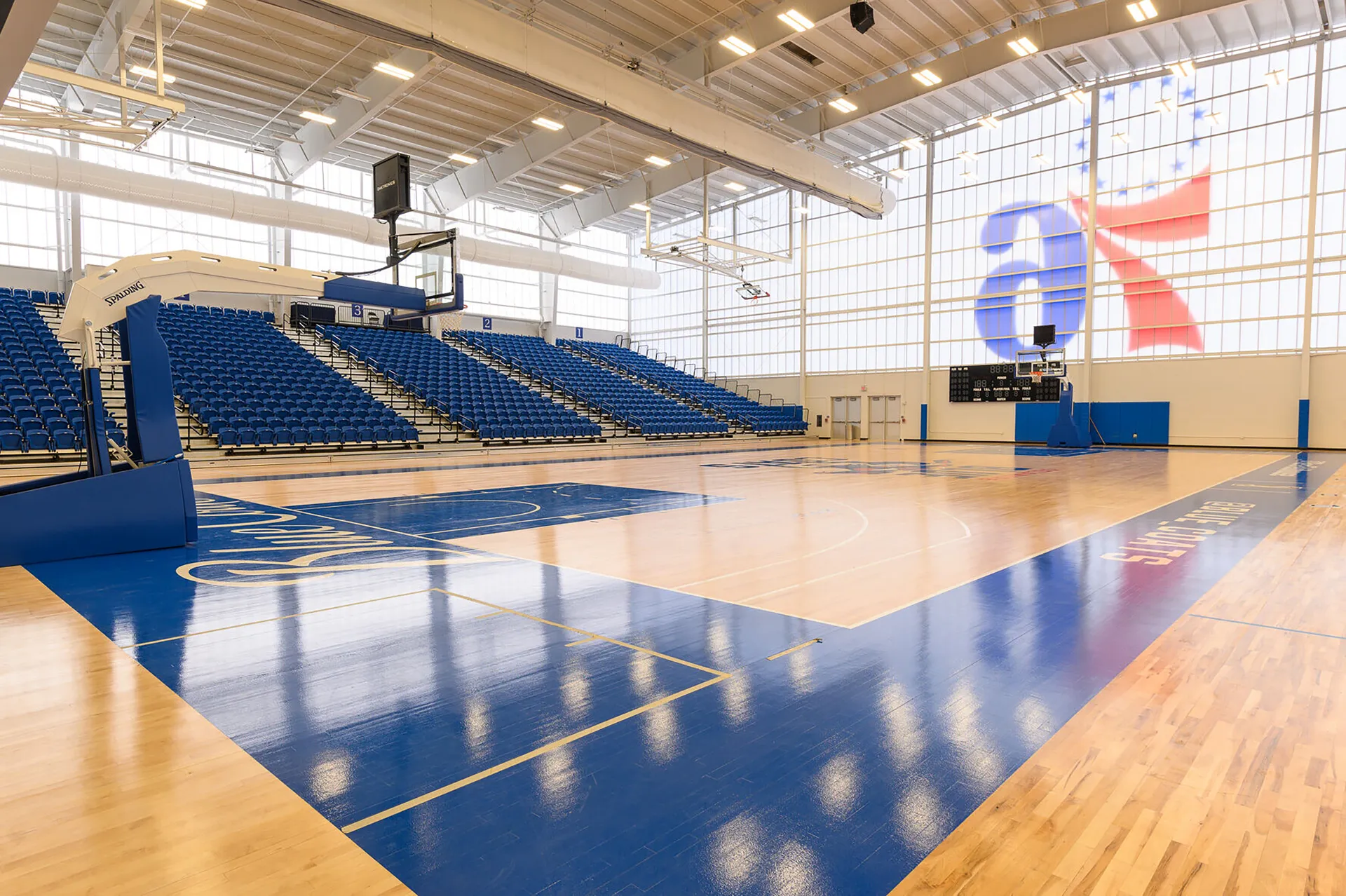 UniQuad polycarbonate wall system in basketball court area