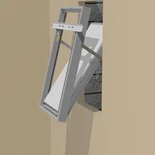 A Defender F2 installed in a wall opening, partially open, showing its angled slats and supporting mechanism against a beige wall.