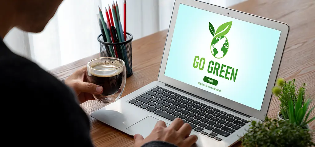 Computer screen with Go Green text