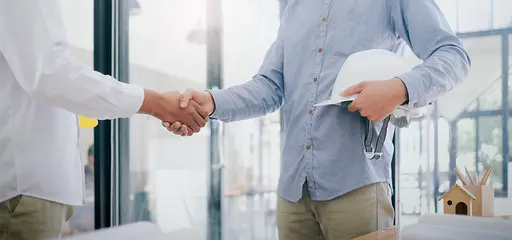 Two people shaking hands