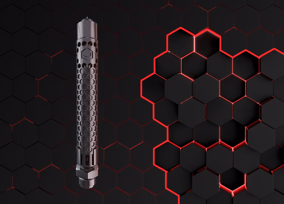 Cylindrical metallic device with hexagonal patterns, set against a black and red hexagonal background.
