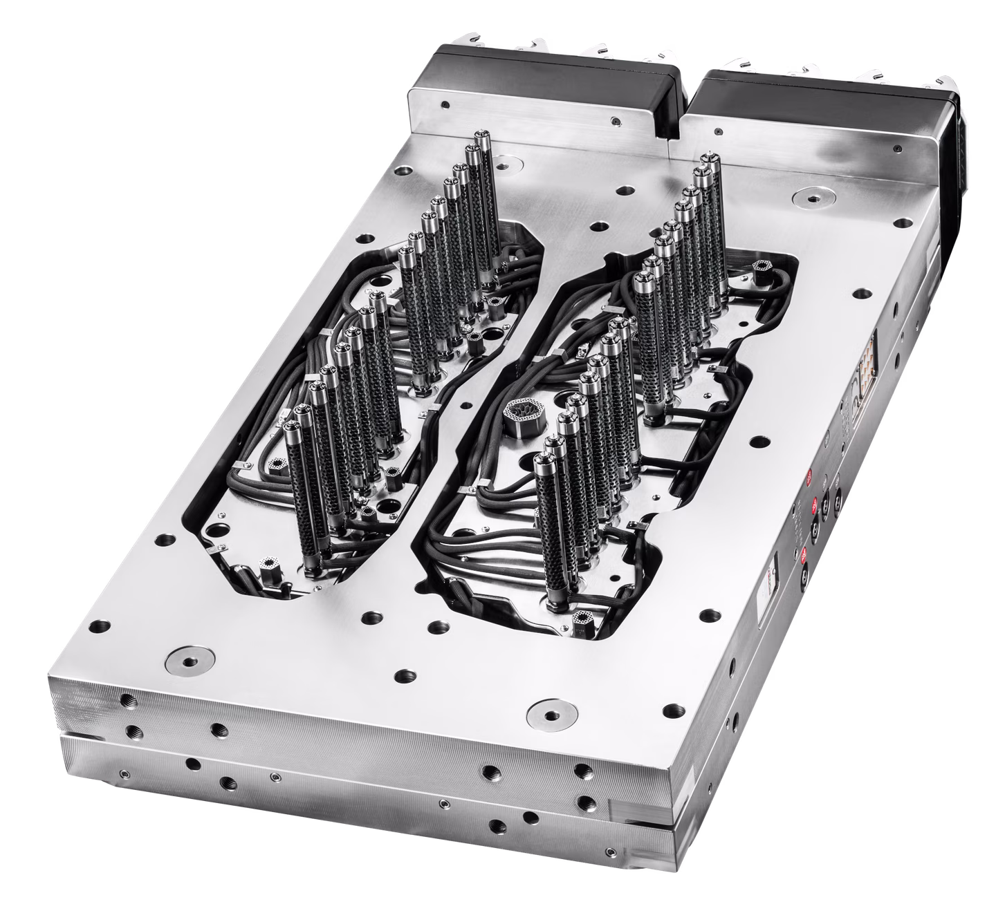 Metal mold with intricate cavities and numerous vertical pins, used for injection molding. It has a sleek, metallic finish.