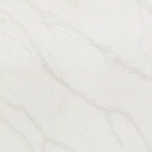 White marble surface with subtle gray veining running diagonally across, creating an elegant and sophisticated pattern.