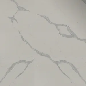 White marble surface with subtle gray veining creating an elegant and natural pattern throughout.