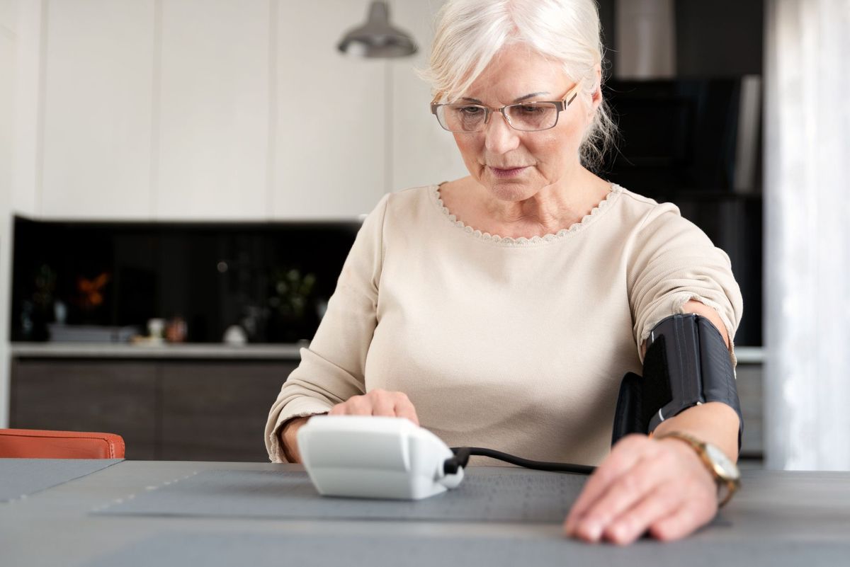 Woman reading blood pressure