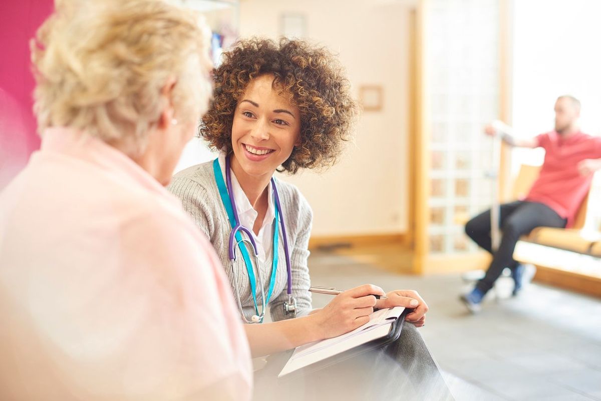 Female 65 talking to her provider