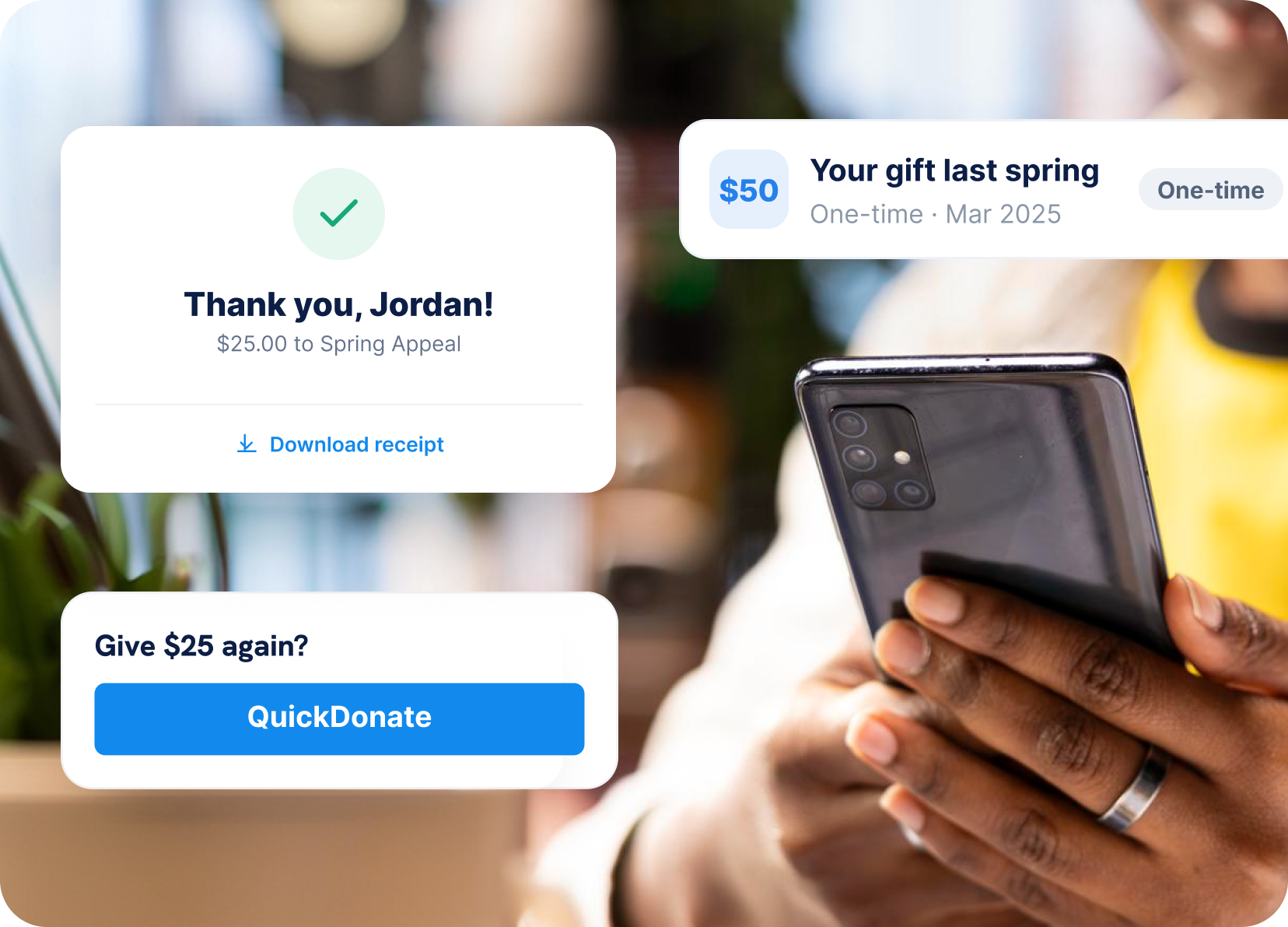 Person holding a smartphone with donation confirmation UI overlays showing a $25 Spring Appeal thank-you and QuickDonate button.
