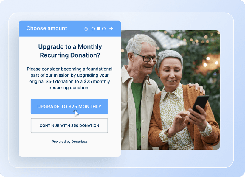 Elderly couple viewing phone, next to donation prompt for upgrading to a monthly recurring donation via "Donorbox."