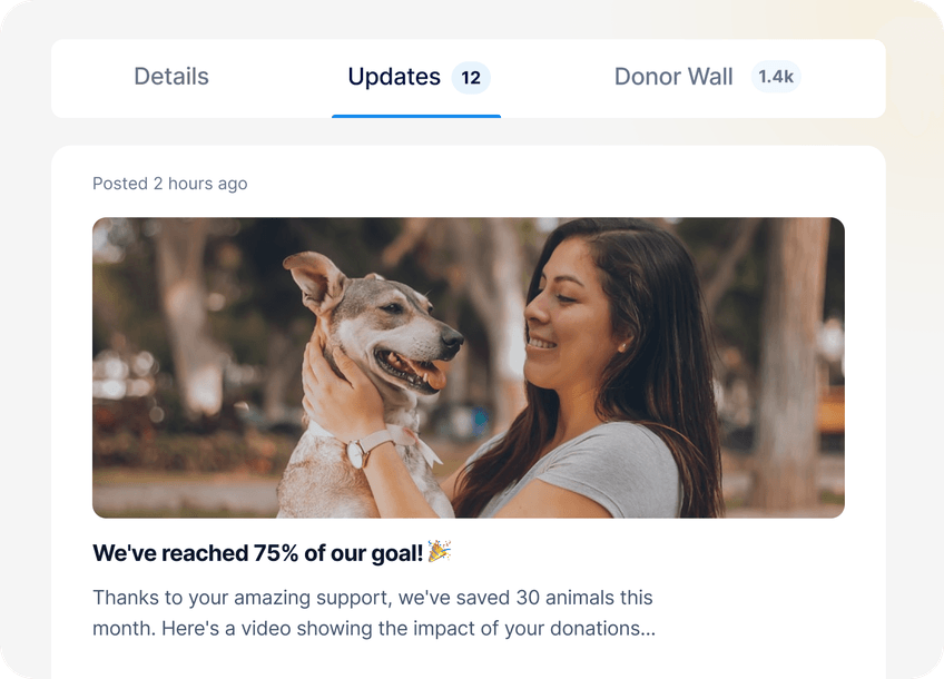Woman joyfully holding a dog outdoors, celebrating a donation goal achievement displayed on the webpage.
