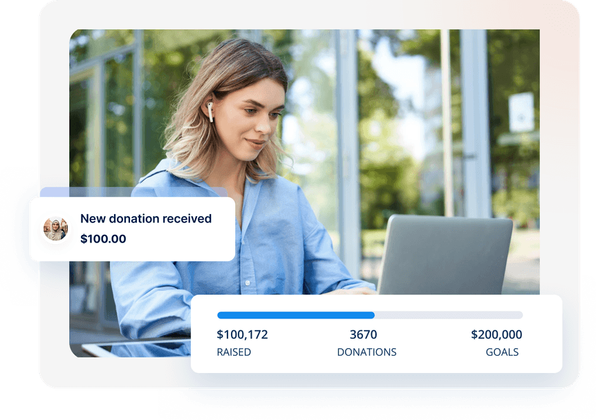 Woman wearing earbuds using a laptop outdoors with donation notification and progress bar showing $100,172 raised towards a $200,000 goal.