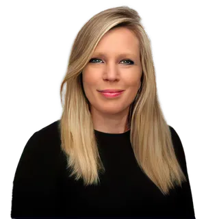 Woman with blonde hair wearing a black top smiling