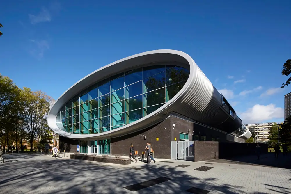 Modern elliptical building with glass facade