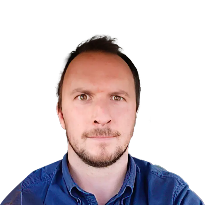 Man with beard in blue shirt