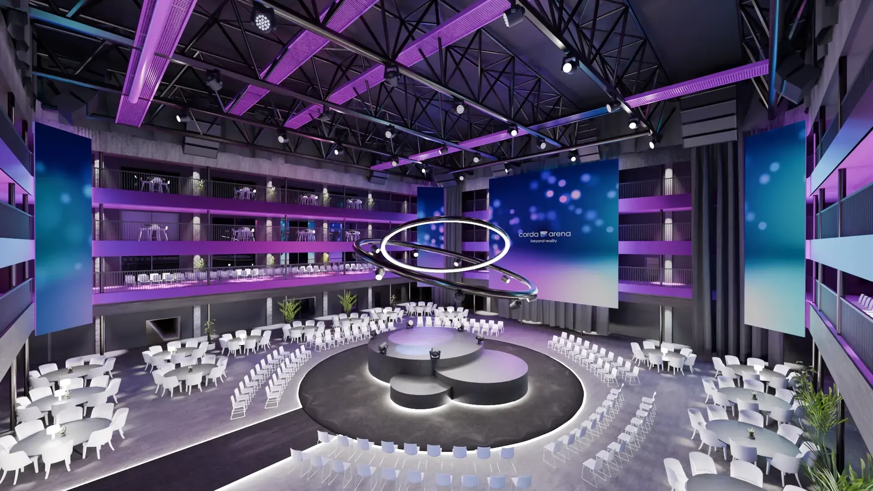 Spacious, modern event space with circular stage, white tables, and vibrant purple lighting, featuring large screens and spiral ceiling design.