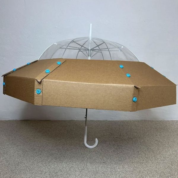 Cardboard UFO Costume fully assembled, with signature blue Makedo Scru connectors visible