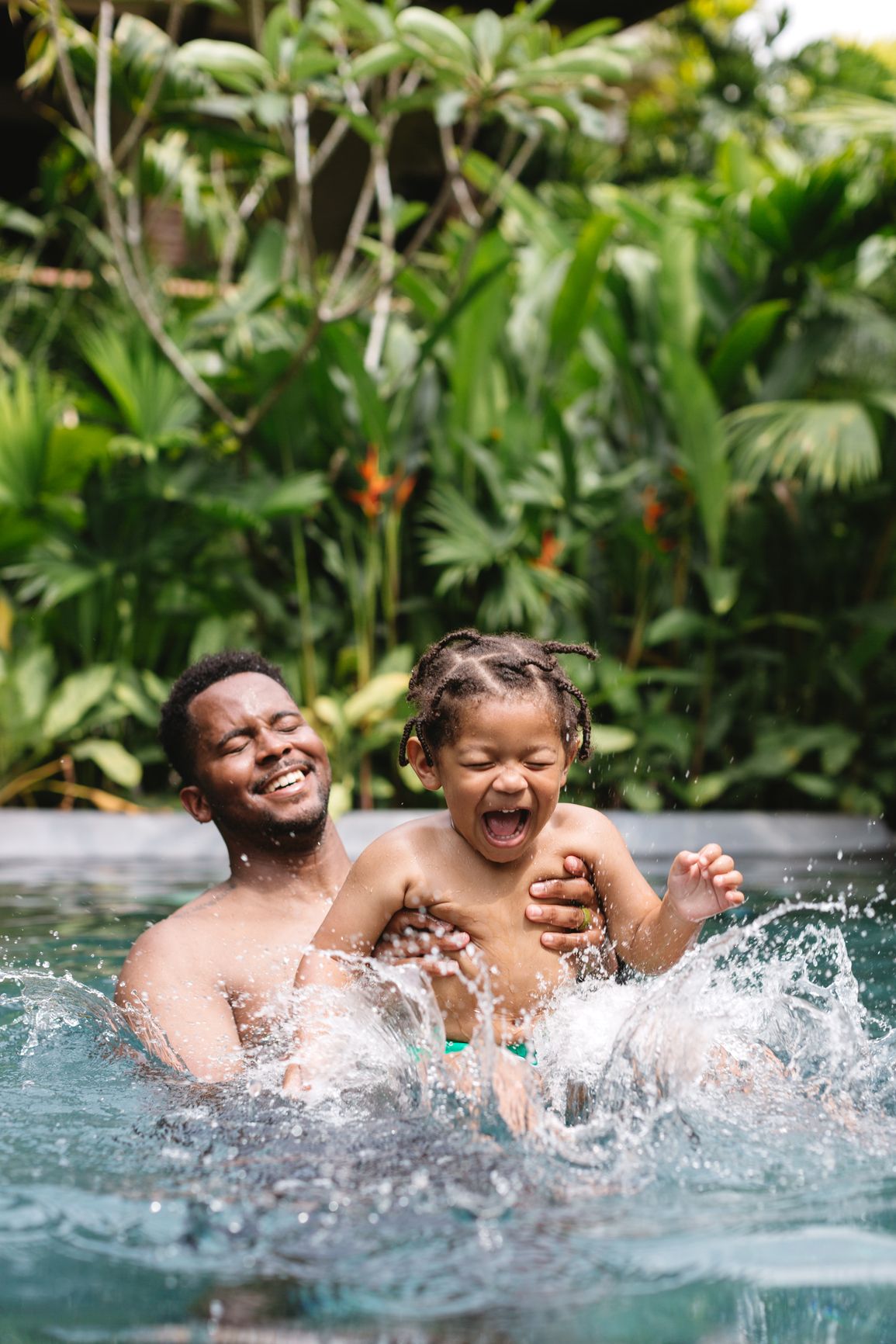 father and child playing