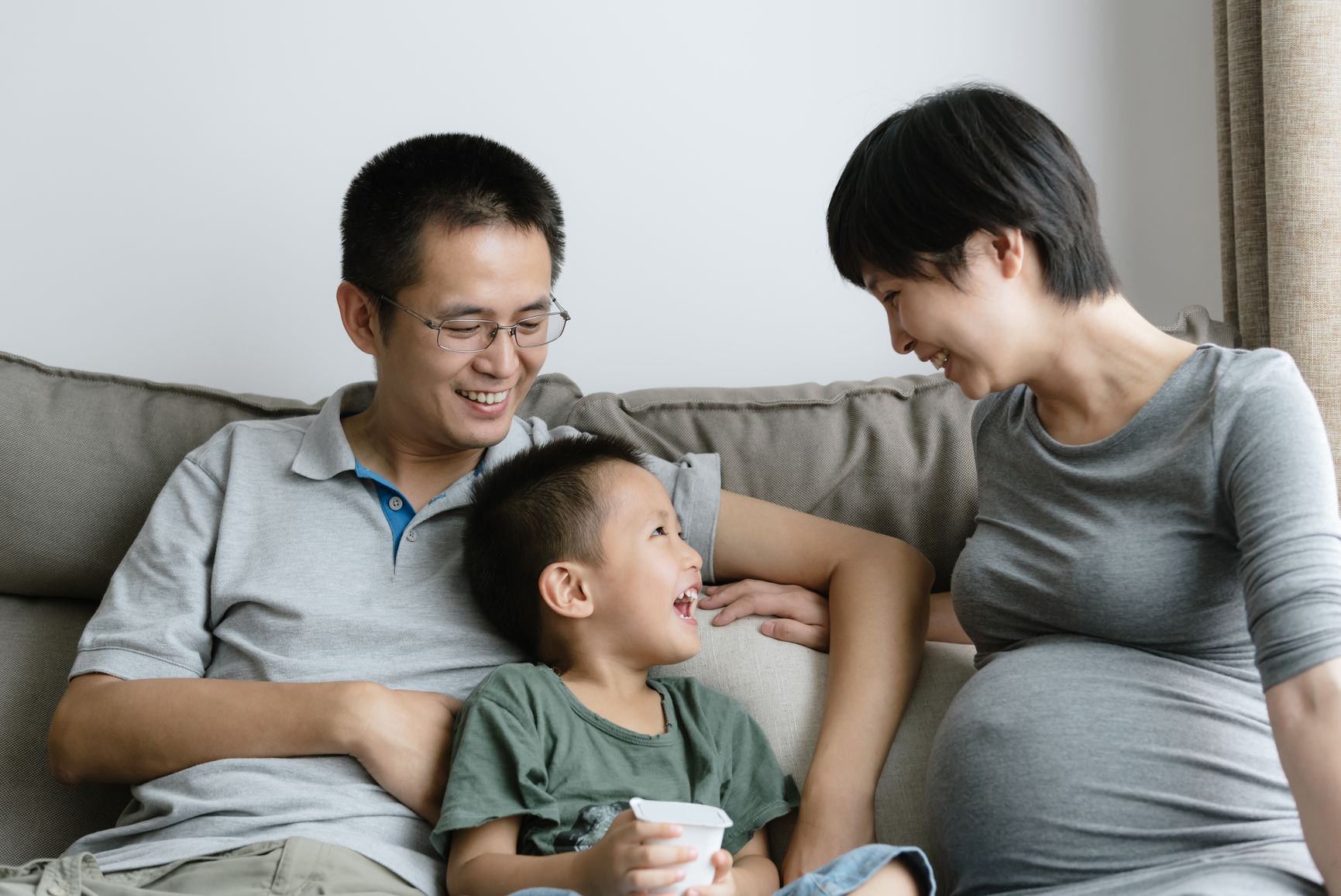 pregnant family with child