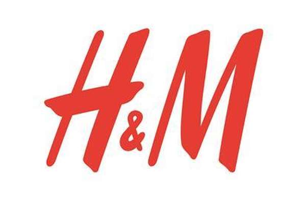 H&M logo, displaying "H&M" in a vibrant red, handwritten-style font on a plain white background.