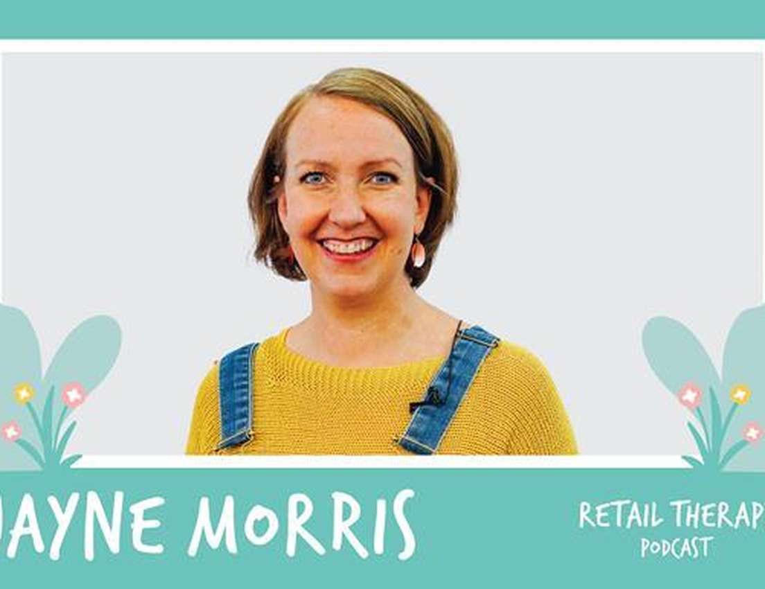 Smiling person in a yellow sweater and denim overalls, framed by a design with leaves. Text: "JAYNE MORRIS, RETAIL THERAPY PO