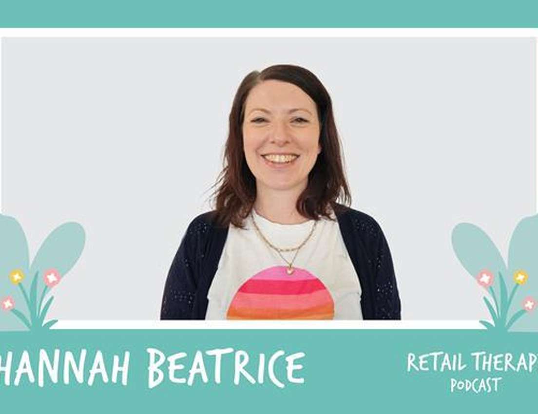 Smiling woman, Hannah Beatrice, in a colorful sun t-shirt, for the Retail Therapy Podcast. Teal background with decorative le