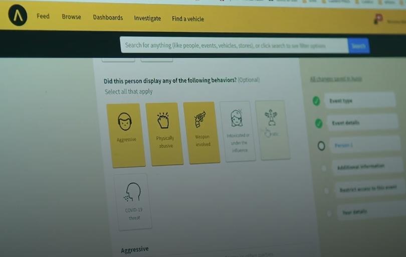 A web application interface showing selectable behavioral options: Aggressive, Physically abusive, Weapon involved, Intoxicated, Erratic, COVID-19 threat.