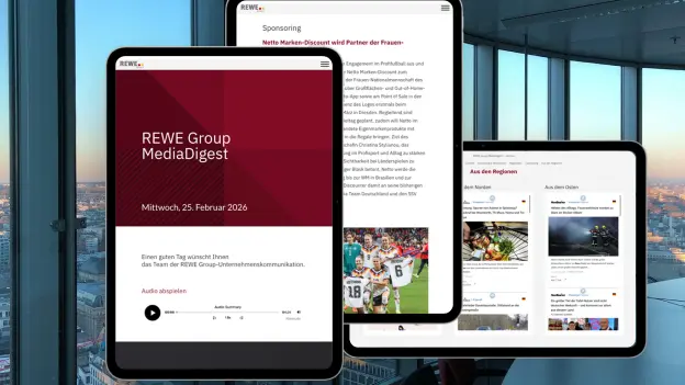 Three tablets display different pages of the REWE Group.
