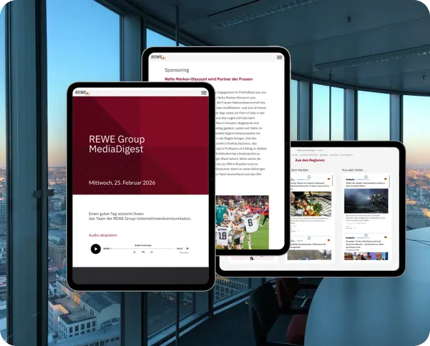 Three tablets display different pages of the REWE Group.