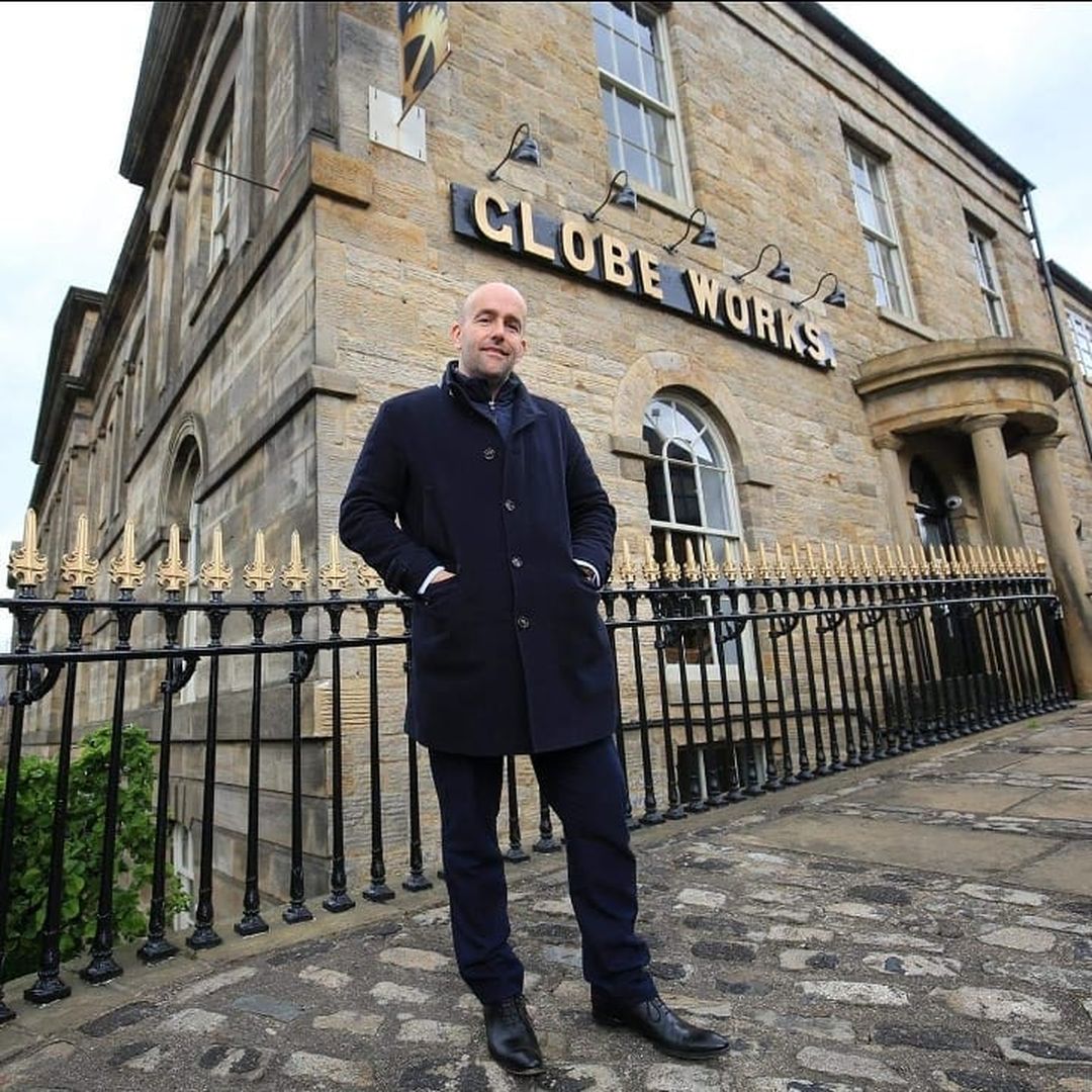 Matt Davison stood in from of Globe Works in Sheffield
