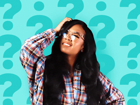 A girl scratching her head