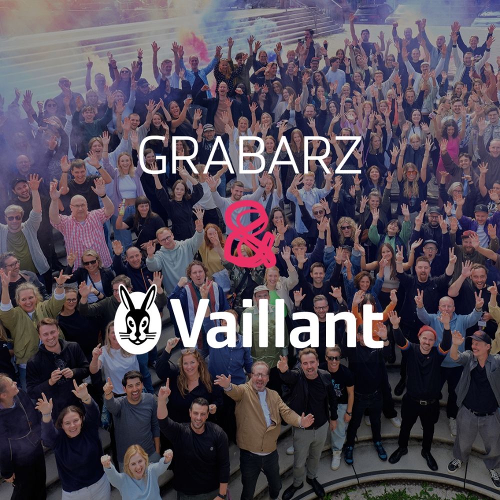 Gruppenbild mit Grabarz-Mitarbeitenden und darüber steht Grabarz & Vaillant