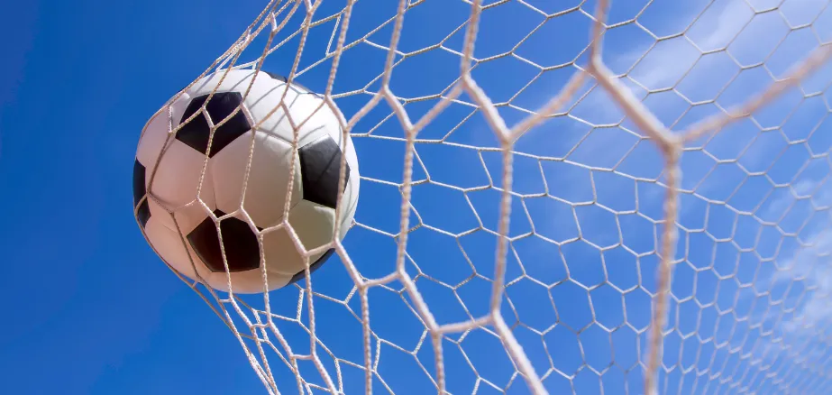 Football going into a net