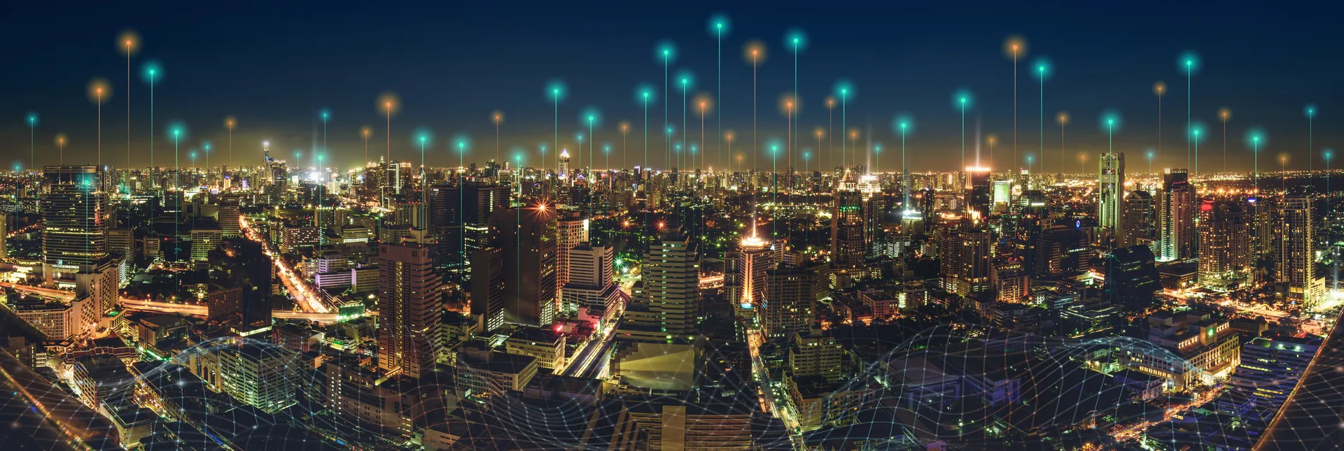 A vibrant city skyline at night with illuminated buildings, glowing points of light that pin point supporters