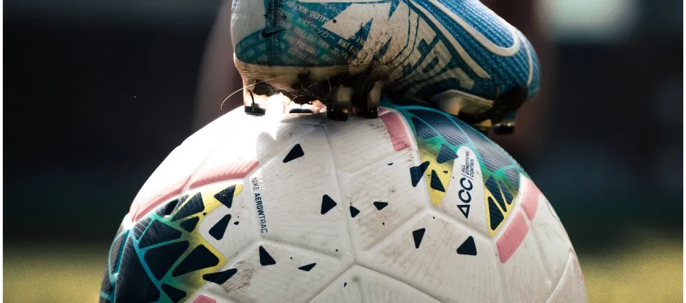 Football shoe on football