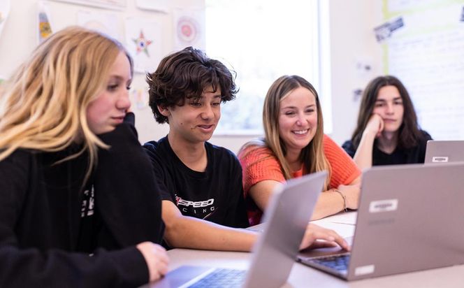 Pacific Collegiate students working on their laptops