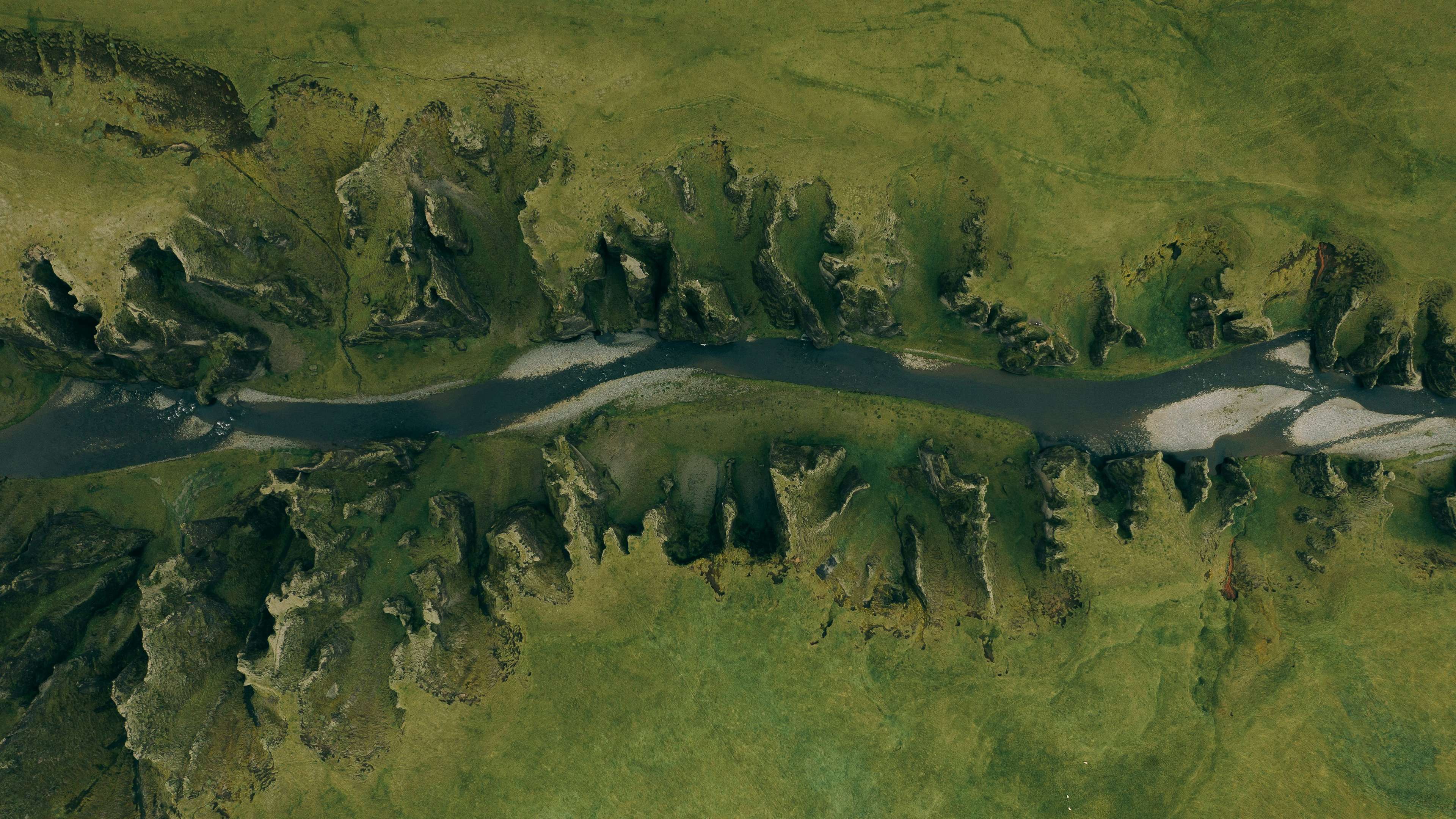 image showing river running through grass-lands