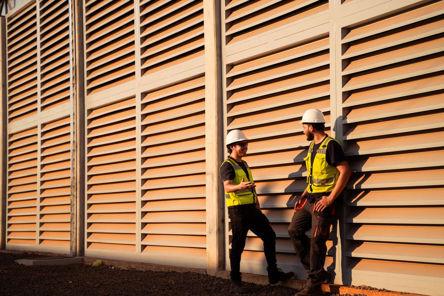 Workers having a conversation outside a datacenter