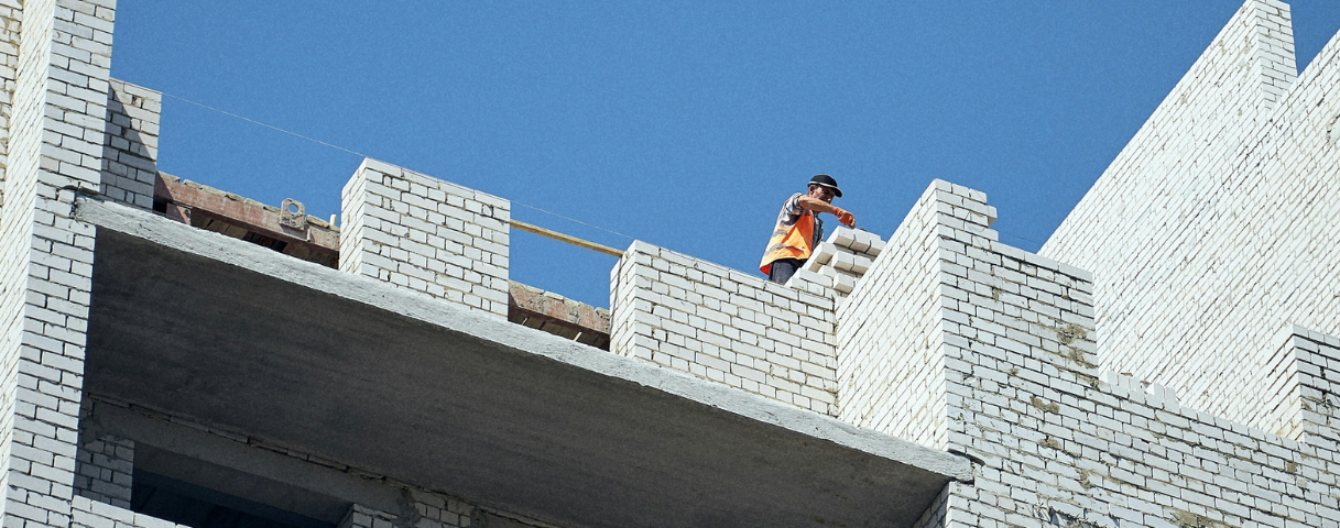 Construction man working on a building