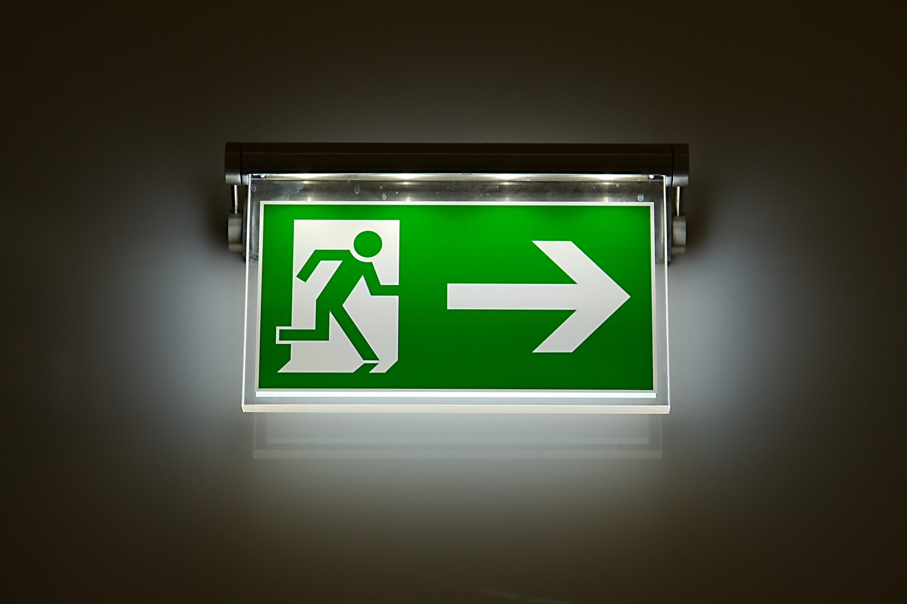 graphic of a running stick figure and arrow to the left.