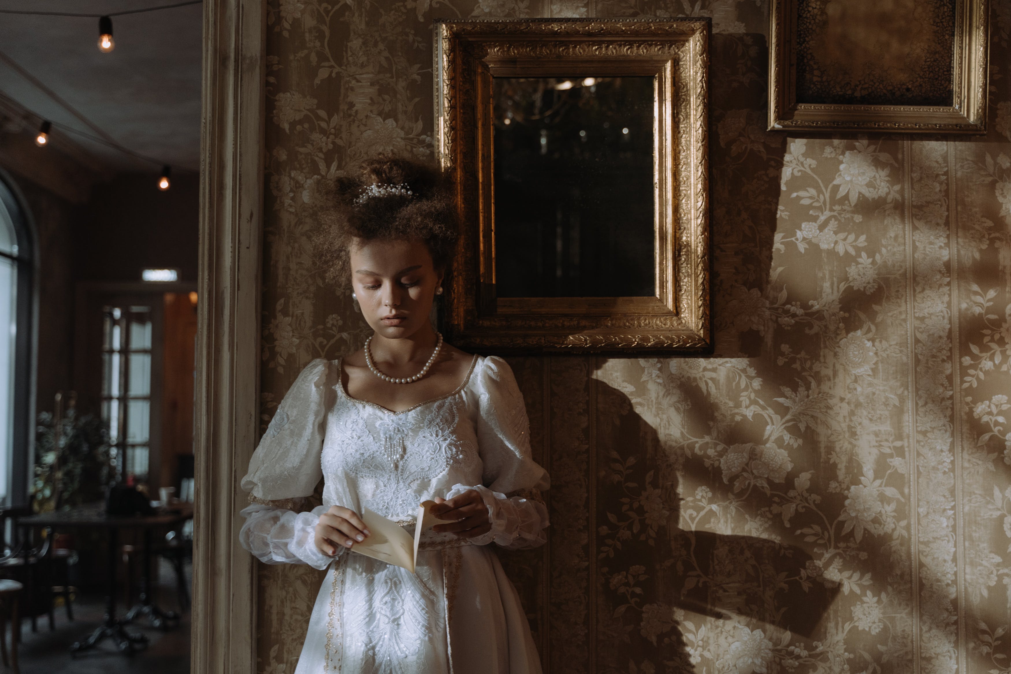 photo of a royal bride looking at notebook