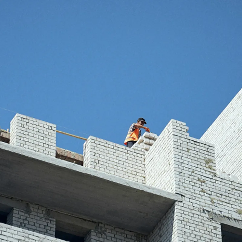 Construction man working on a building